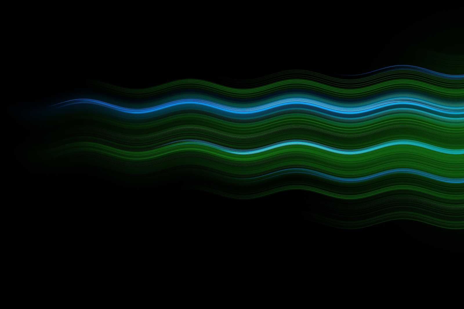 a black background with a green and blue wave