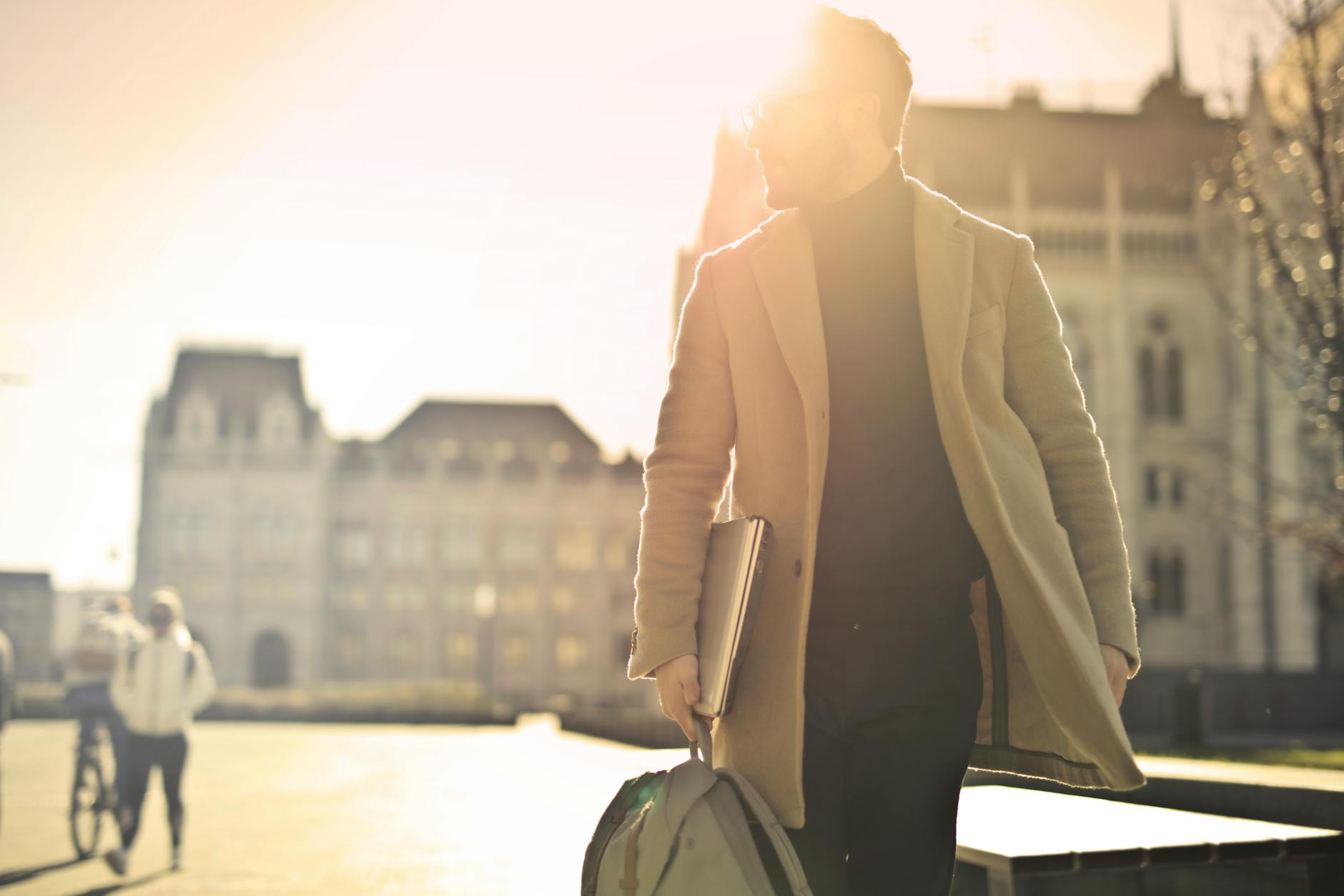 photo of man wearing brown coat